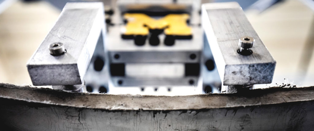 bendable concrete with University of Michigan logo.