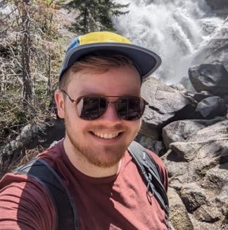 Aidan Mickleburgh by waterfall Medium